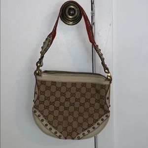 Gucci monogram shoulder bag with leather and metal